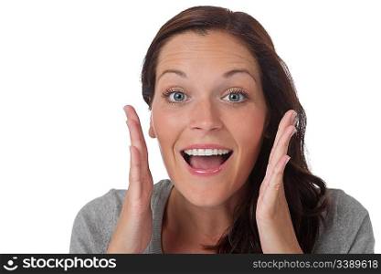 Surprised young happy woman on white background