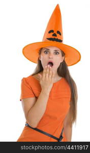 Surprised young woman in Halloween hat