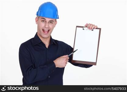 Surveyor pointing at blank clip-board