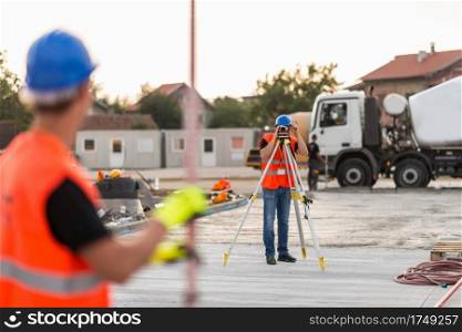 Surveyors on construction site