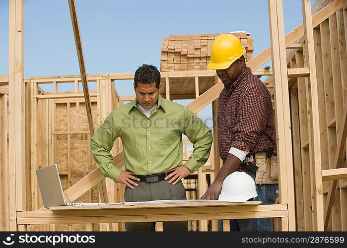 Surveyors working on construction site