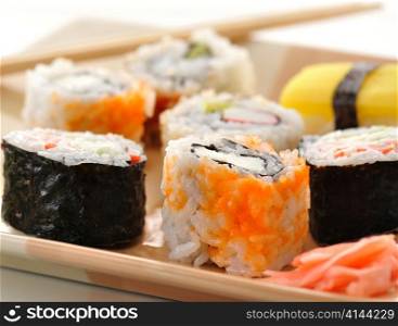 sushi assortment in a dish, close up