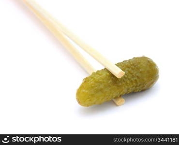 sushi cucumber gherkin on chopstick