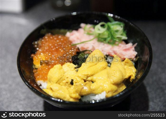 Sushi don , raw salmon tuna and caviar on rice