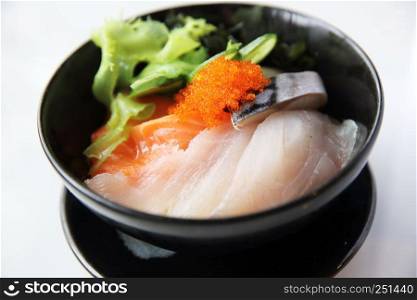 Sushi don , raw salmon tuna on rice
