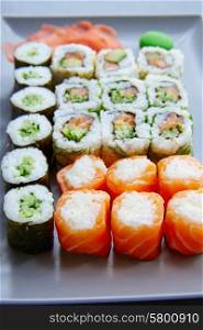 Sushi Maki and Niguiri California roll and wasabi