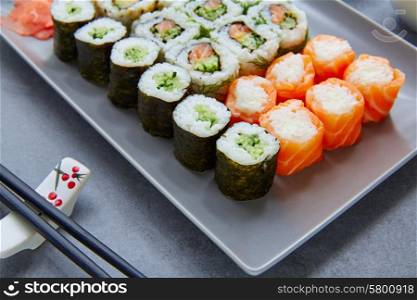 Sushi Maki and Niguiri with California roll and sticks