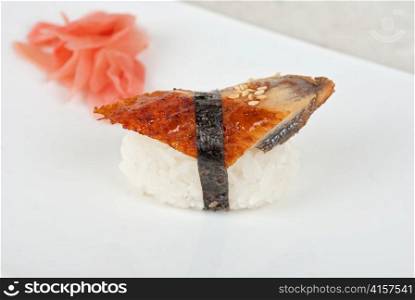 sushi of eel with ginger, seaweed and sesame