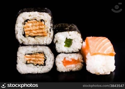 sushi over black background