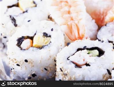 Sushi over plate in close up, horizontal image