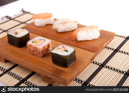 sushi pieces, isolated over white background