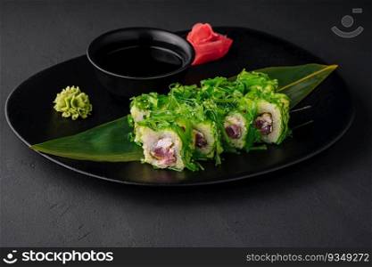 Sushi plate on black stone. japanese food.