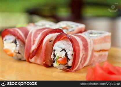 Sushi roll with bacon