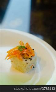 Sushi Roll with fish eggs and Conger, onion, tobiko and cheese