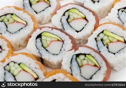Sushi rolls assortment close up on white background