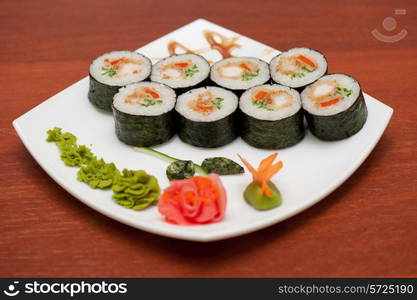 sushi rolls with crabs meat at plate