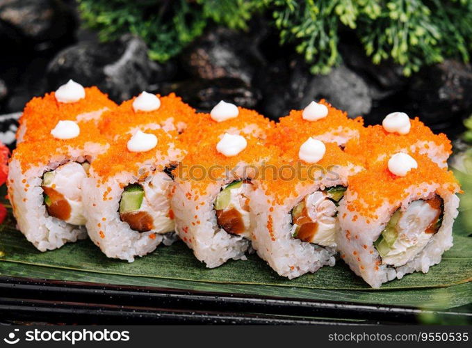 Sushi set with cheese, rice, shrimp, cucumber and caviar