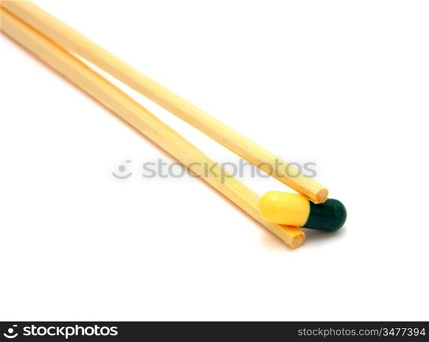 sushi tablet on chopstick