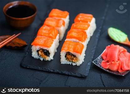sushi with fresh fresh fish on the board