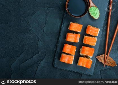 sushi with fresh fresh fish on the board