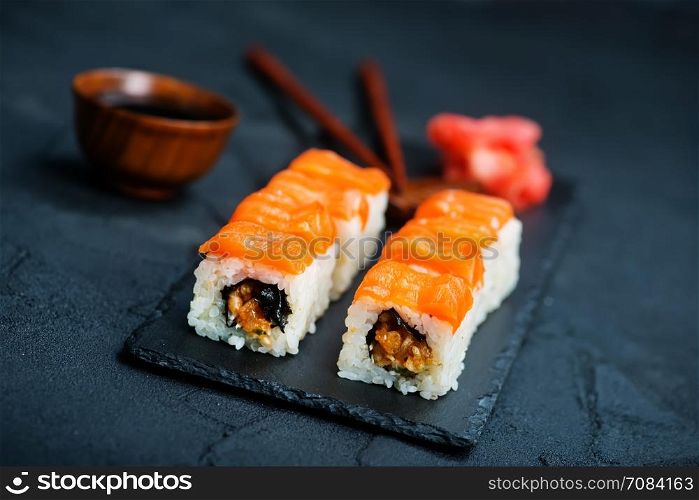 sushi with fresh fresh fish on the board