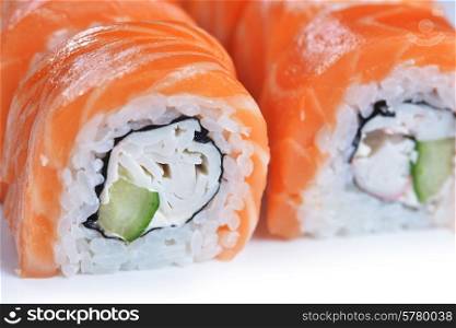 sushi with salmon and avocado on plate