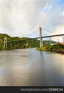 Suspension bridge in Norway. Norwegian infrastructure.. Suspension bridge in Norway