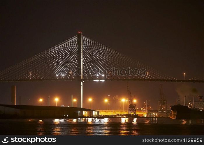 Suspension bridge lit up at night, Talmadge Bridge, Savannah River, Savannah, Georgia, USA