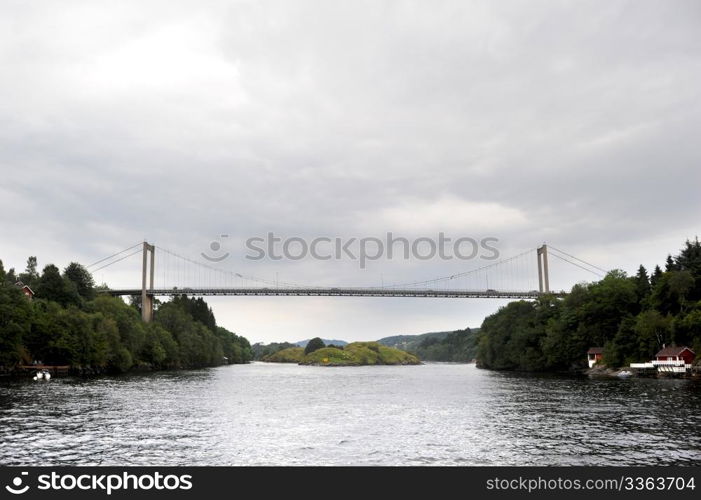 Suspension bridge over the bay. Norway