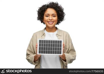 sustainable energy, power and sustainability concept - happy smiling woman with solar battery model over white background. happy smiling woman with solar battery model