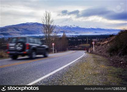 suv car driving on traveling new zealand highway
