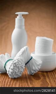 swabs and bottle with jar and pads