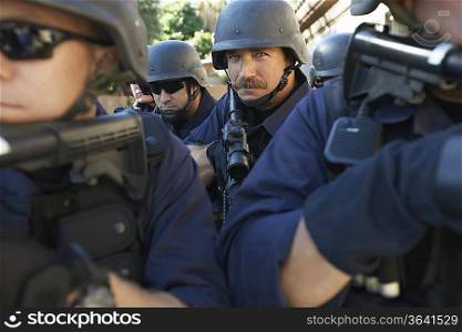Swat officers with guns