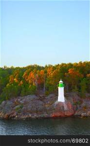Swedish landscape - Coast of small island ind Baltic Sea with lighthouse