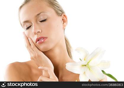 sweet and beautiful girl with a big white flower in sleeping pose