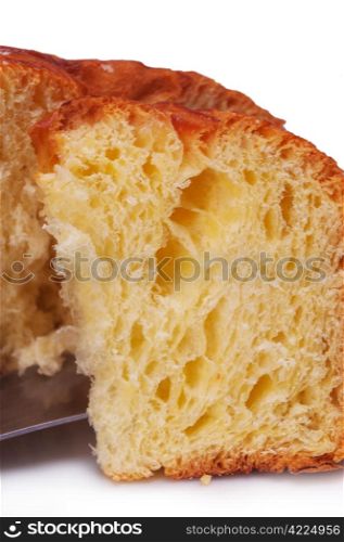 sweet bread sliced closeup over white background