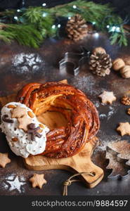 Sweet Bread Wreath decorated with stars cookies. Honey brioche garland with chocolate and nuts. Holiday recipes. Braided Bread. Cinnamon Twist Bread Wreath. Christmas Wreath Bread