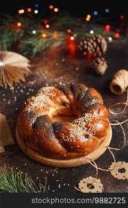 Sweet Bread Wreath. Honey brioche garland with dried berries and nuts. Holiday recipes. Braided Bread.Twist Bread Wreath with poppy seeds and sesame seeds. Christmas Wreath Bread