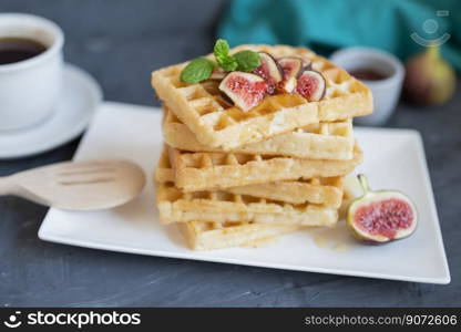 sweet breakfast Belgian waffles with honey and figs