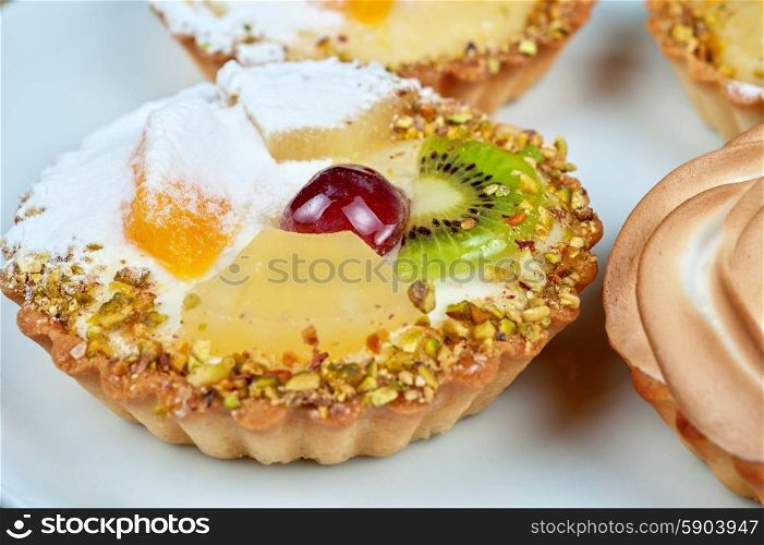 sweet cakes . sweet cakes with fruits closeup photo