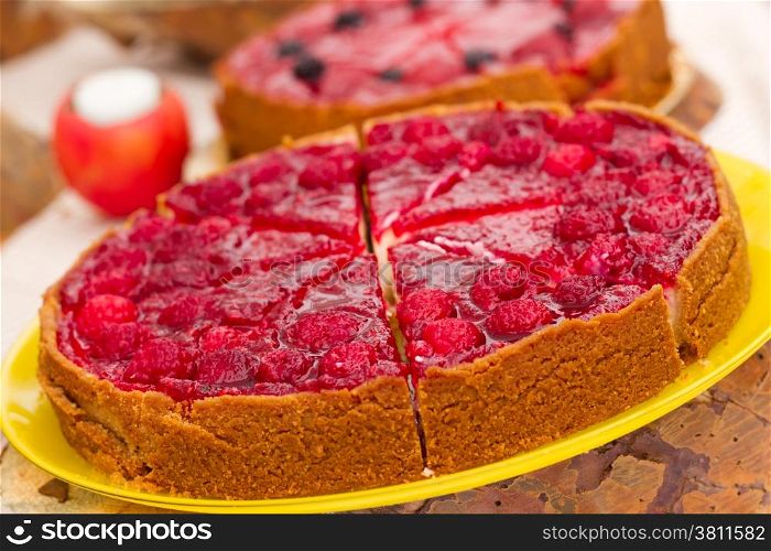 Sweet cakes with berries on table