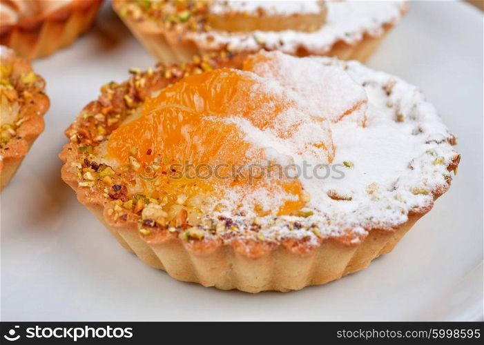 sweet cakes with fruits. sweet cakes with fruits closeup photo