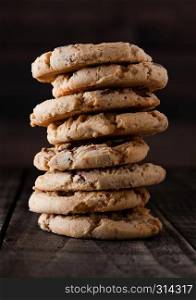 Sweet caramel oatmeeal gluten free cookies on old wooden background