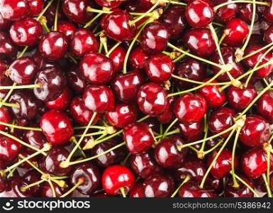 Sweet cherry fruits close up as a background