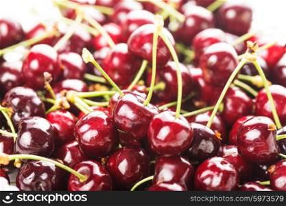 Sweet cherry fruits close up as a background. Sweet cherry background