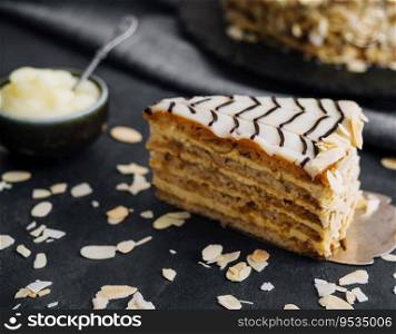 Sweet dessert slice of honey cake on a spatula