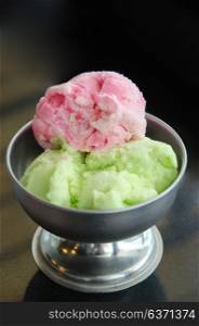 sweet dessert , strawberry ice cream and green tea ice cream in bowl