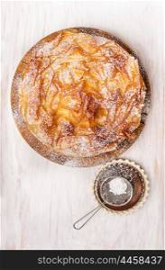 Sweet Filo pastry cake and Sifter Spoon, top view