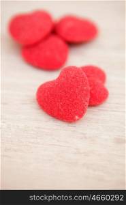 Sweet hearts on a gray wooden background. Soft focus