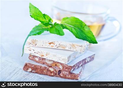 sweet nougat with nut on white paper